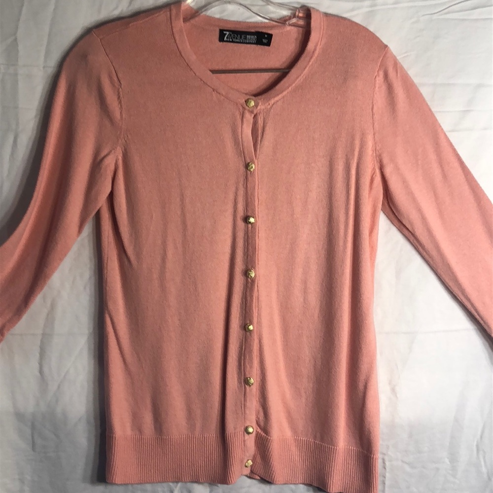 Pink sweater, never wore it, tags removed